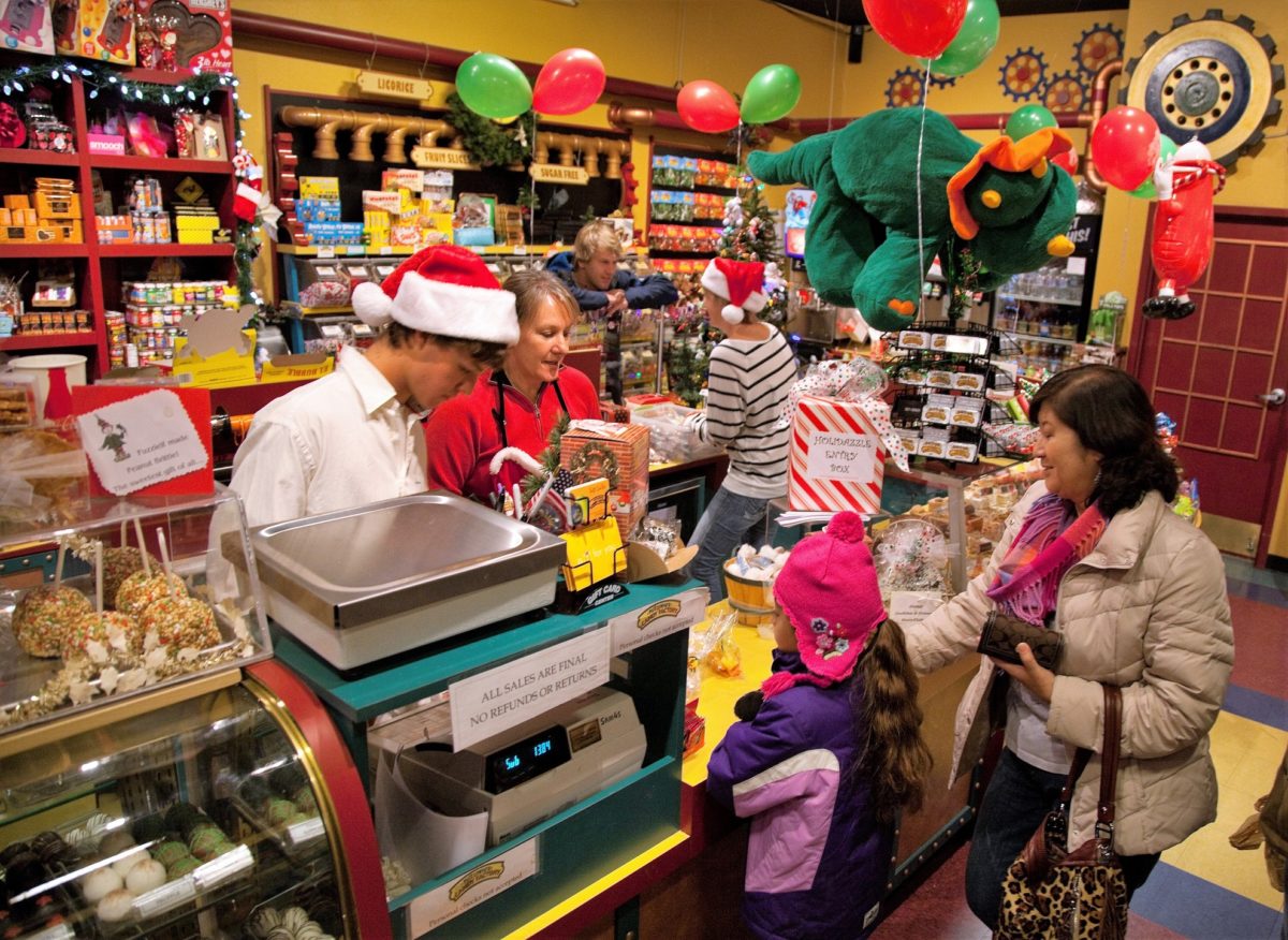 Kids in a candy shop checking out at the register.